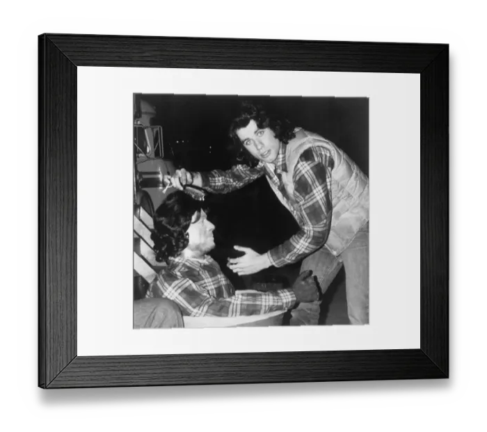 Framed Print : John Travolta Combs Stuntman's Hair Framed Print : John Travolta Combs Stuntman's Hair
