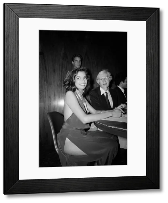 Framed Print : Bianca Jagger and Andy Warhol at Party