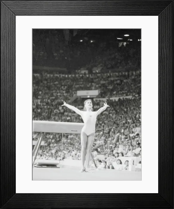 Framed Print : Nadia Comaneci Posing During Gymnastic Feat