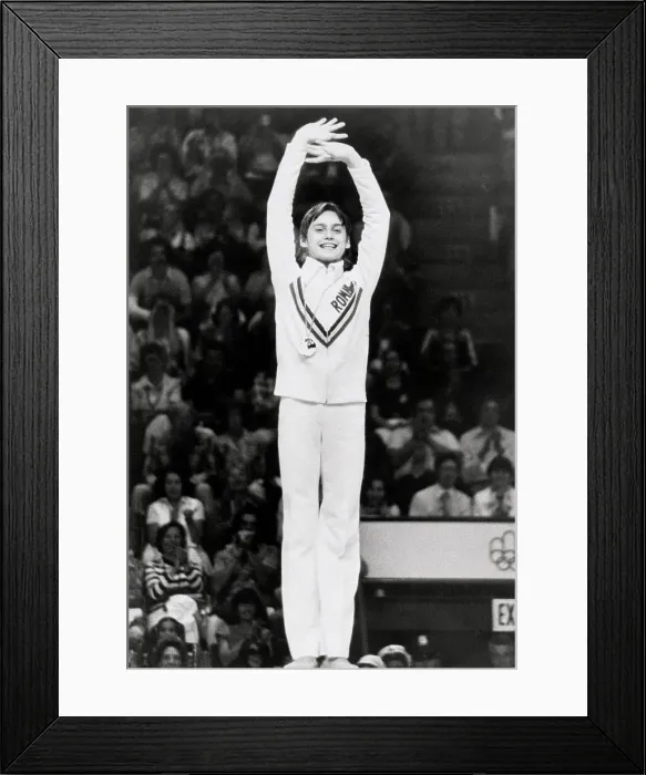 Framed Print : Nadia Comaneci Waving on Victory Stand Framed Print : Nadia Comaneci Waving on Victory Stand
