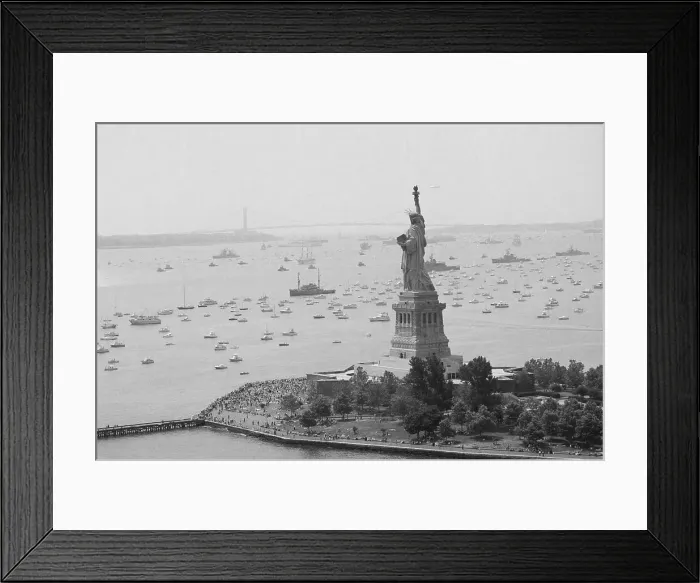 Framed Print : Long Line Of Ships Sails Past Statue Framed Print : Long Line Of Ships Sails Past Statue