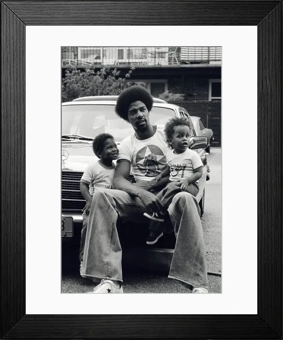 Framed Print : Julius Erving Relaxing With His Children Framed Print : Julius Erving Relaxing With His Children