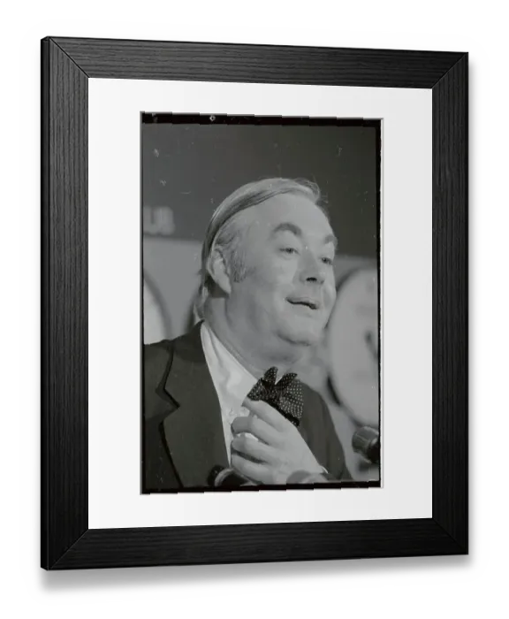 Framed Print : Daniel Moynihan Adjusting His Bow Tie During Speech Framed Print : Daniel Moynihan Adjusting His Bow Tie During Speech