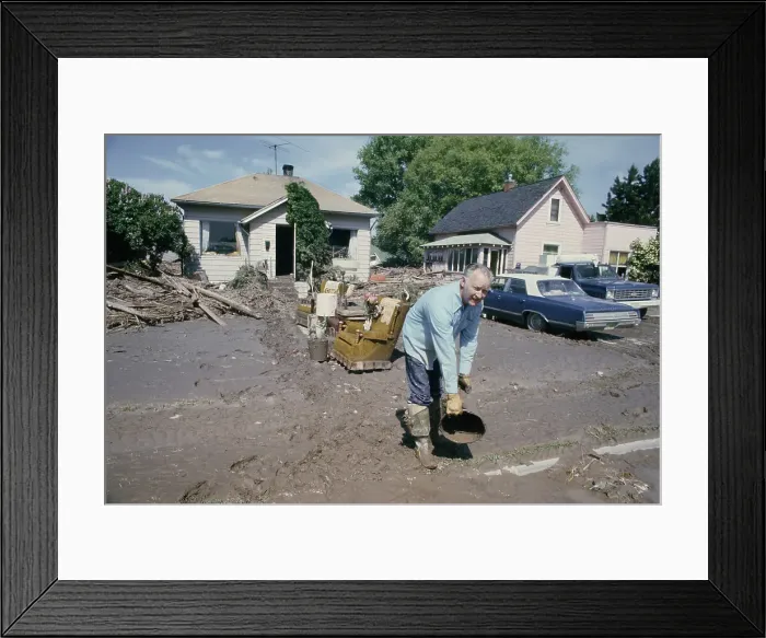 Framed Print : Man Clearing Mud Framed Print : Man Clearing Mud