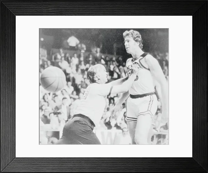 Framed Print : Referee Restraining Dave Cowens During Basketball Game Framed Print : Referee Restraining Dave Cowens During Basketball Game