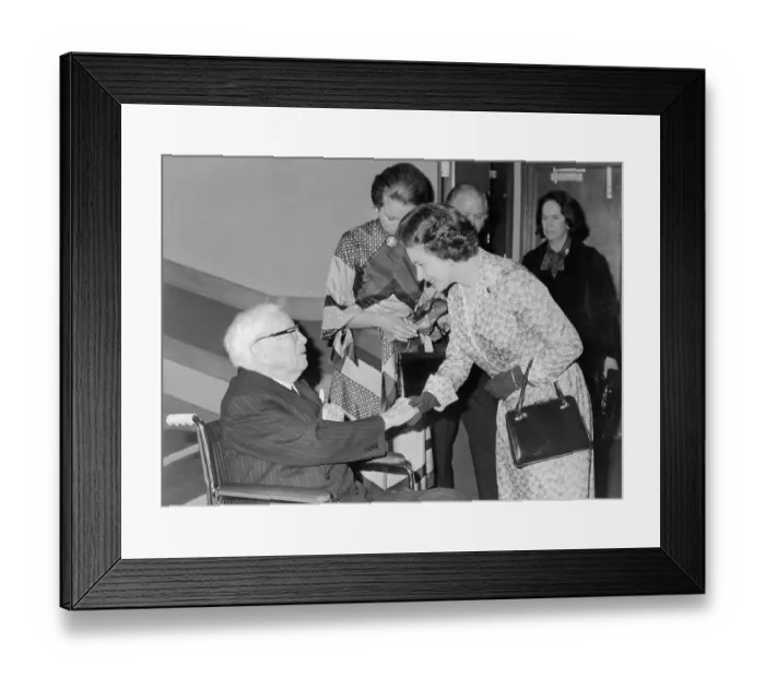 Framed Print : Queen Elizabeth Shaking Hands with Charlie Chaplin Framed Print : Queen Elizabeth Shaking Hands with Charlie Chaplin