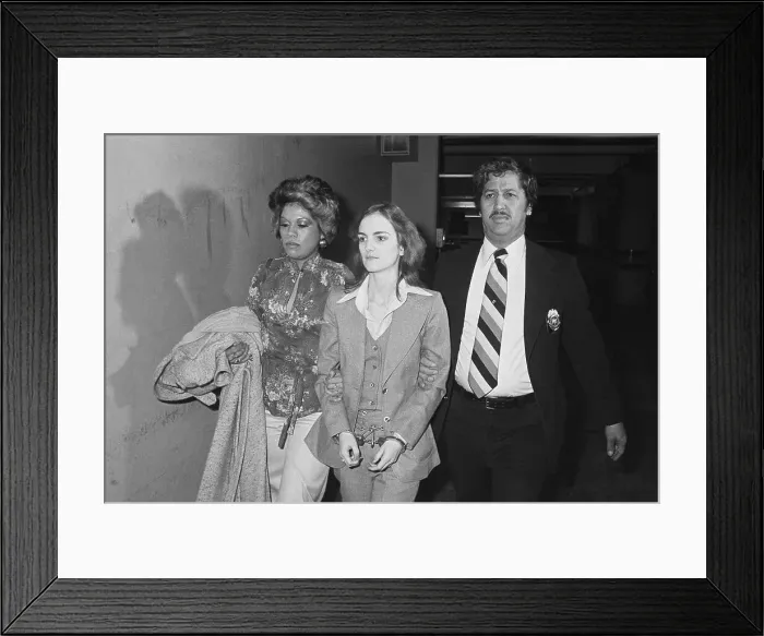 Framed Print : Patty Hearst Being Escorted in Handcuffs Framed Print : Patty Hearst Being Escorted in Handcuffs