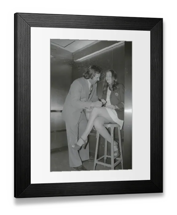 Framed Print : Jim Hunter Standing by Young Woman on Stool Framed Print : Jim Hunter Standing by Young Woman on Stool
