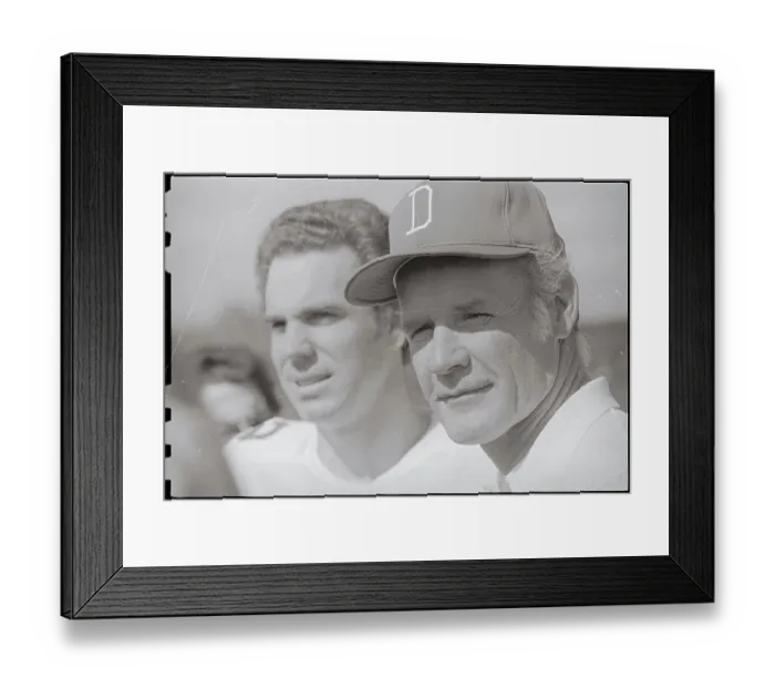 Framed Print : Coach and Quarterback Watching Practice Framed Print : Coach and Quarterback Watching Practice