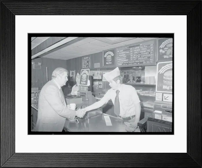 Framed Print : Terry Sanford Shaking Hands with Restaurant Employee Framed Print : Terry Sanford Shaking Hands with Restaurant Employee