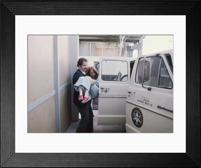 Framed Print : Lynette Fromme Being Carried Framed Print : Lynette Fromme Being Carried