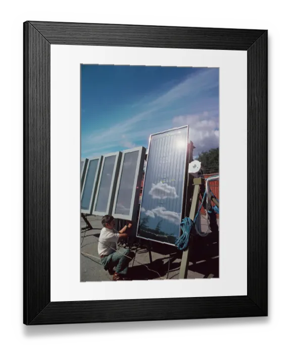 Framed Print : Scientist Checking Solar Panels Framed Print : Scientist Checking Solar Panels