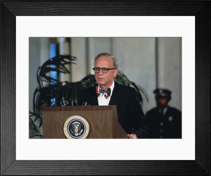 Framed Print : Man Speaking at a Press Conference