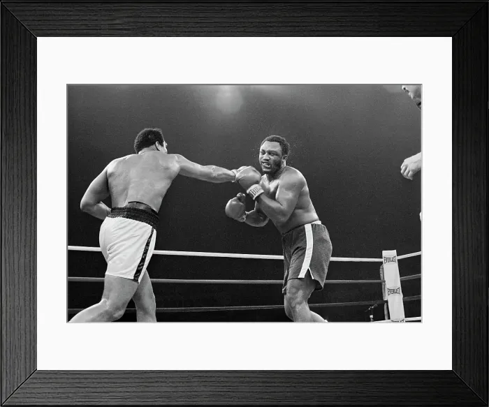 Framed Print : Muhammad Ali Punching Joe Frazier Framed Print : Muhammad Ali Punching Joe Frazier