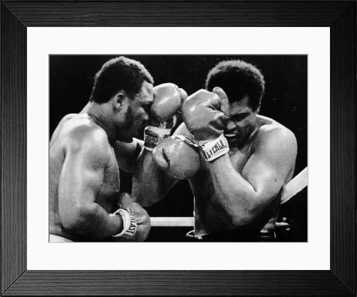 Framed Print : Muhammad Ali Covers As Joe Frazier Punch Framed Print : Muhammad Ali Covers As Joe Frazier Punch