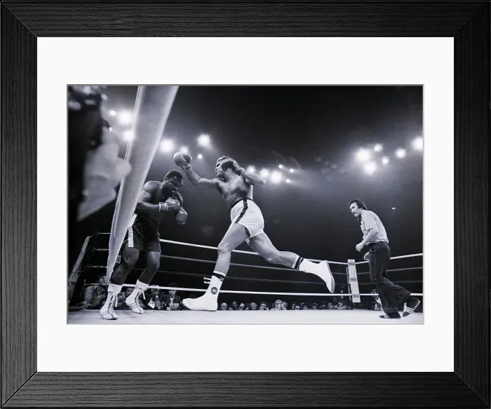 Framed Print : Boxer Muhammad Ali Lunges At Joe Frazier Framed Print : Boxer Muhammad Ali Lunges At Joe Frazier