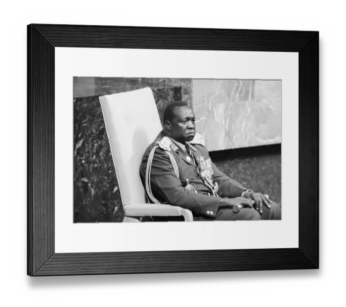 Framed Print : Idi Amin Shown Seated in Uniform Framed Print : Idi Amin Shown Seated in Uniform