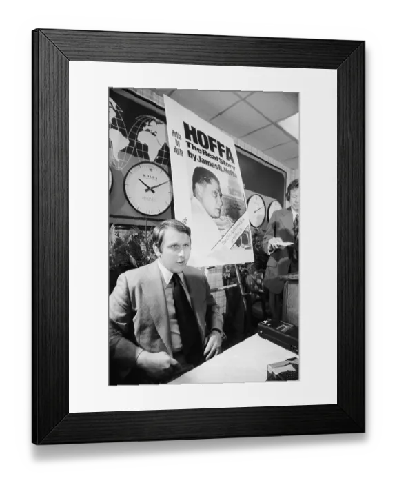 Framed Print : Portrait of James P. Hoffa with Poster of Father Framed Print : Portrait of James P. Hoffa with Poster of Father