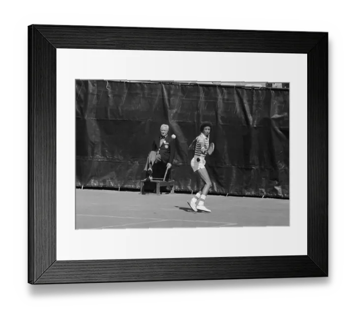 Framed Print : Arthur Ashe Back handing a Return Framed Print : Arthur Ashe Back handing a Return