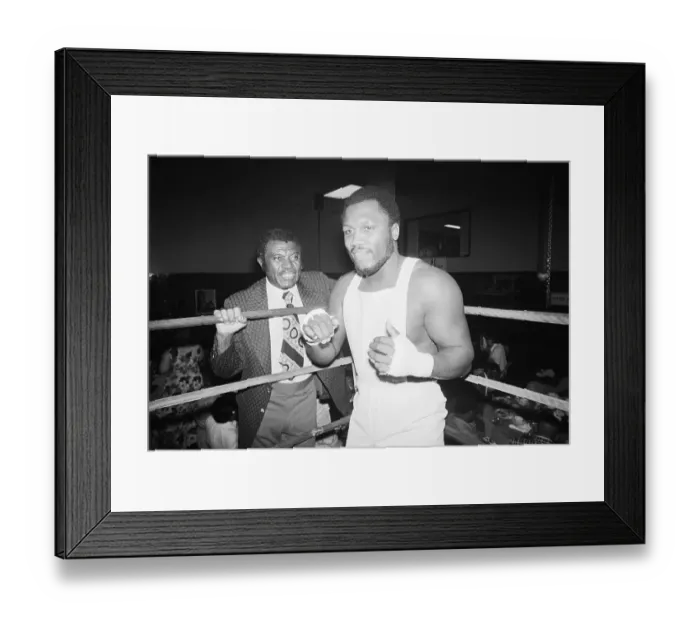 Framed Print : Trainer with Shadow Boxing Joe Frazier