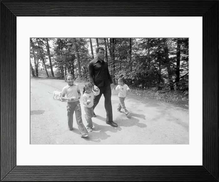 Framed Print : Muhammad Ali Walking with Twin Daughters Framed Print : Muhammad Ali Walking with Twin Daughters