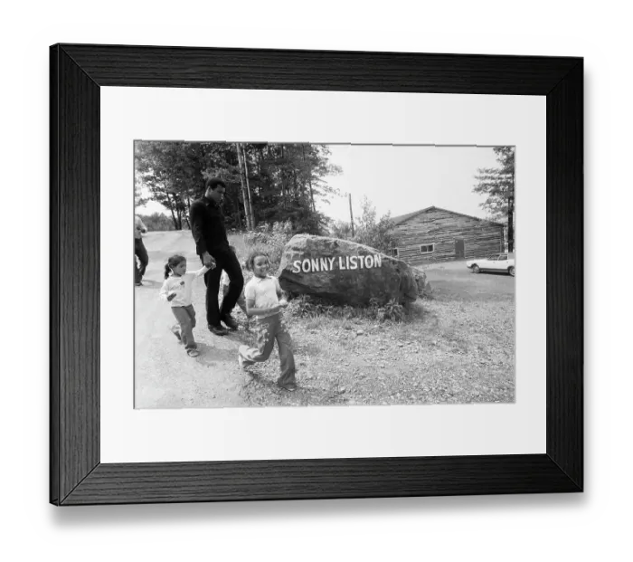 Framed Print : Muhammad Ali Walking with Twin Daughters Framed Print : Muhammad Ali Walking with Twin Daughters