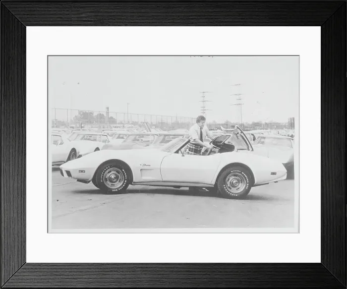 Framed Print : Car Dealer Examining His Own Recent Purchase Framed Print : Car Dealer Examining His Own Recent Purchase