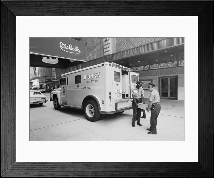 Framed Print : Brinks Men Handling Money