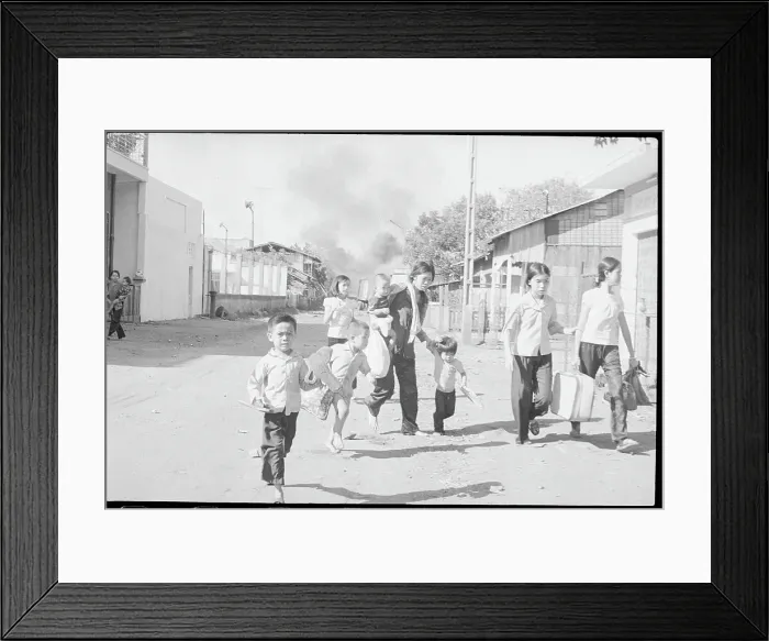 Framed Print : Family Fleeing Bombing Framed Print : Family Fleeing Bombing
