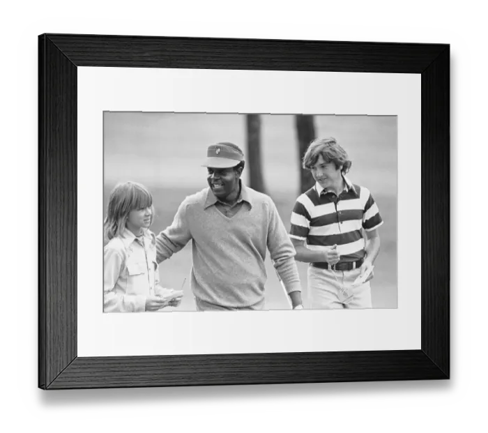 Framed Print : Lee Elder Conversing with Two Youngsters