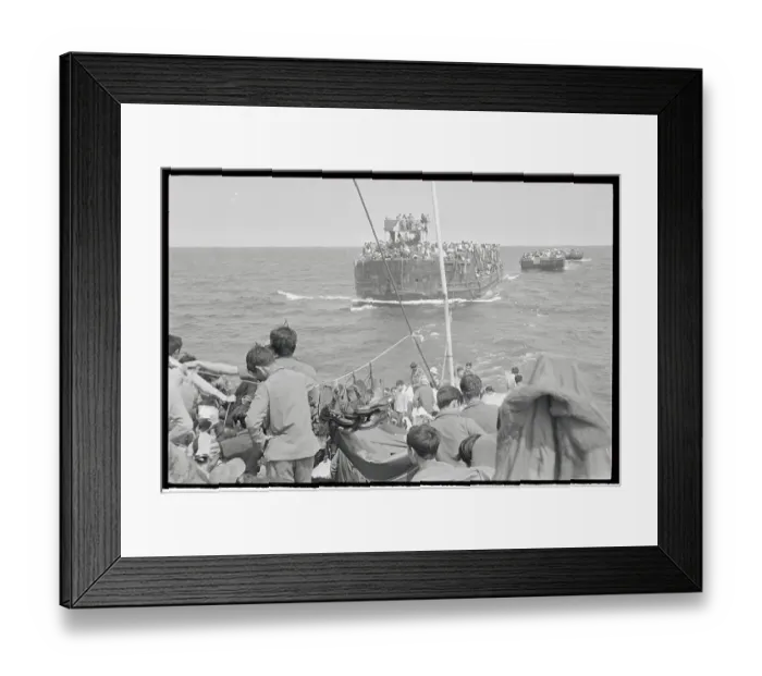 Framed Print : Vietnamese Refugees Being Towed Behind a Larger Ship Framed Print : Vietnamese Refugees Being Towed Behind a Larger Ship