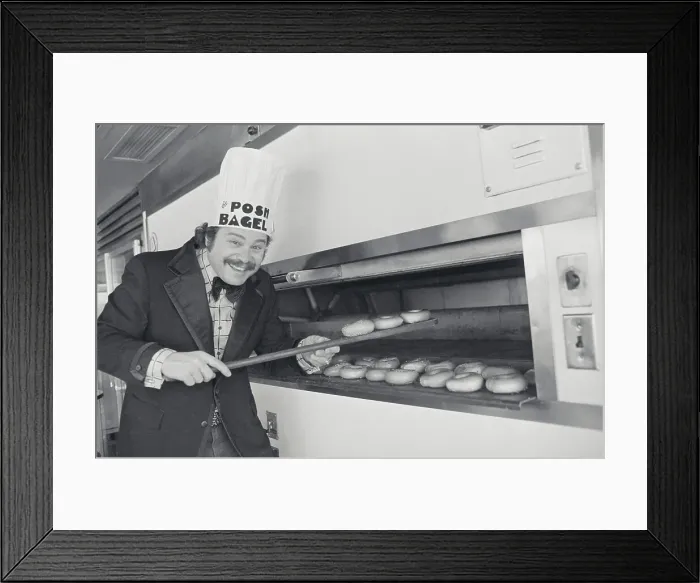 Framed Print : Actor Art Metrano at His Bagel Establishment in Hollywood