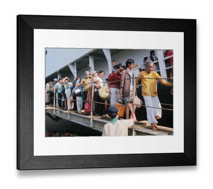 Framed Print : Vietnamese Refugees Leaving Ship Framed Print : Vietnamese Refugees Leaving Ship