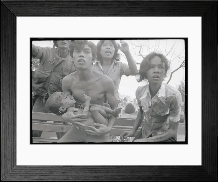 Framed Print : Father Holding Wounded Child Framed Print : Father Holding Wounded Child