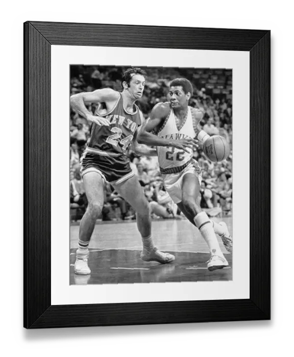 Framed Print : John Drew (22) drives to the basket against Knicks Bill Bradley 