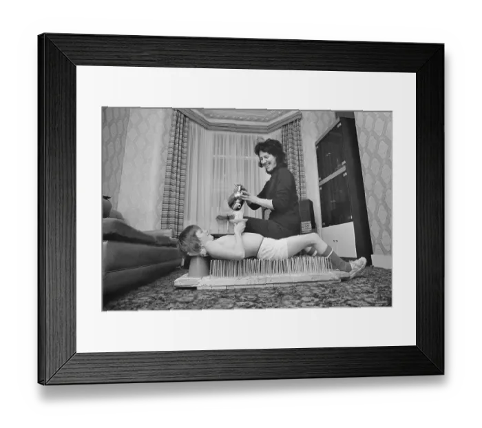 Framed Print : Mark Herman Lying on a Bed of Nails Framed Print : Mark Herman Lying on a Bed of Nails