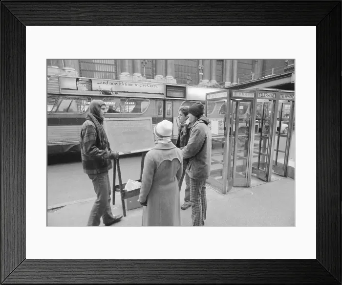 Framed Print : A Follower of Reverend Moon Handing Out Literature Framed Print : A Follower of Reverend Moon Handing Out Literature