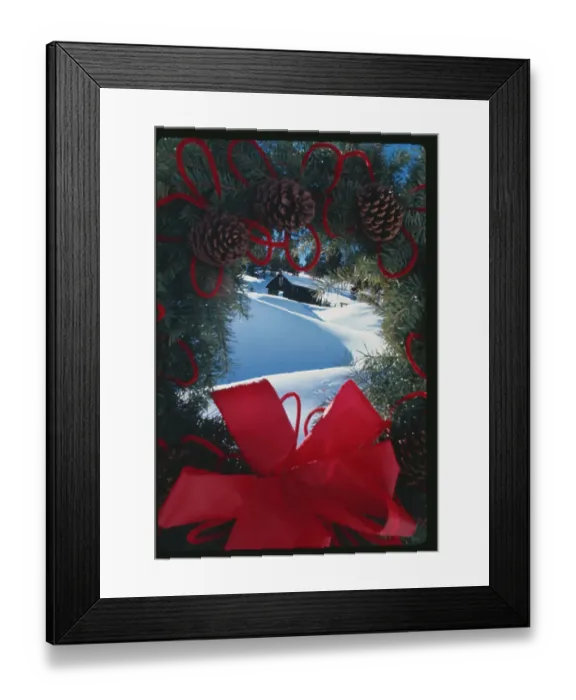 Framed Print : Christmas Wreath Framing a Snowy Hillside Scene Framed Print : Christmas Wreath Framing a Snowy Hillside Scene