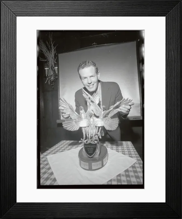 Framed Print : Bobby Unser Holding Wing of His Golden Eagles Framed Print : Bobby Unser Holding Wing of His Golden Eagles
