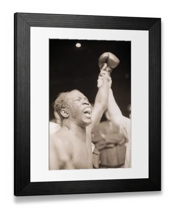 Framed Print : Boxer with Arm Raised in Victory Framed Print : Boxer with Arm Raised in Victory