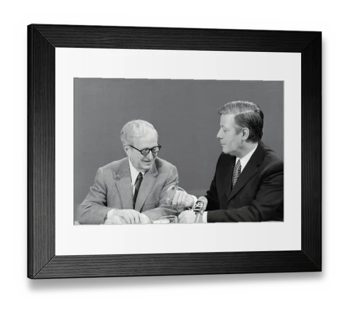 Framed Print : Helmut Schmidt Inviting Lawrence Spivak a Try Framed Print : Helmut Schmidt Inviting Lawrence Spivak a Try