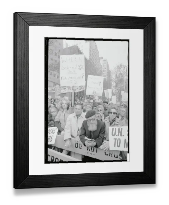 Framed Print : Protester Leaning Against a Police Barrier Framed Print : Protester Leaning Against a Police Barrier