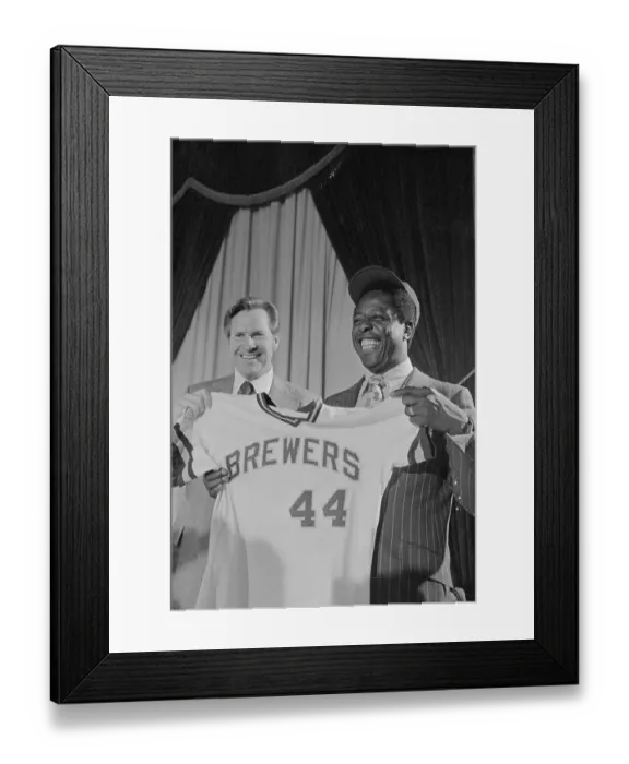 Framed Print : Hank Aaron Holding Baseball Jersey and Standing by Del Crandall Framed Print : Hank Aaron Holding Baseball Jersey and Standing by Del Crandall