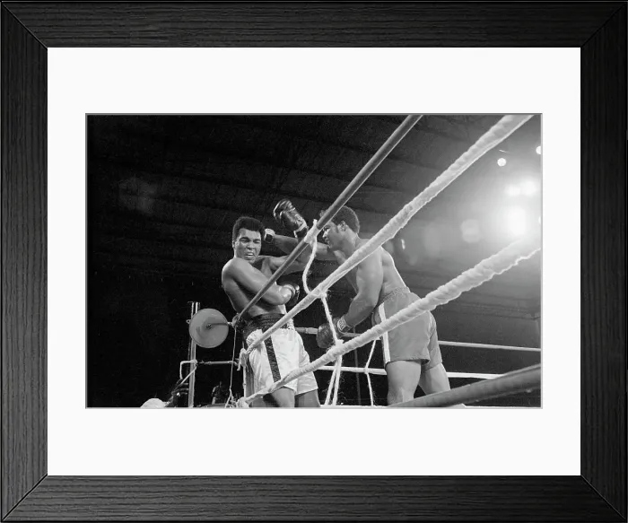 Framed Print : George Foreman Punching Muhammad Ali by the Ropes Framed Print : George Foreman Punching Muhammad Ali by the Ropes