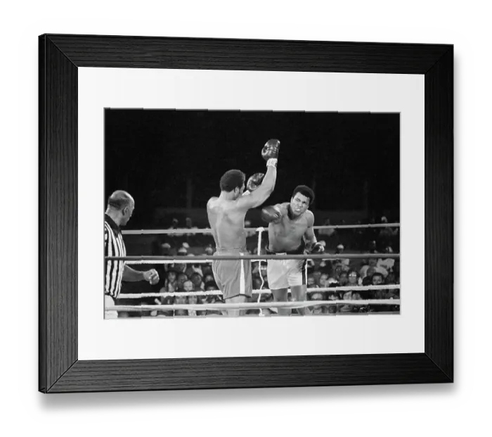 Framed Print : Muhammad Ali Punching George Foreman Framed Print : Muhammad Ali Punching George Foreman