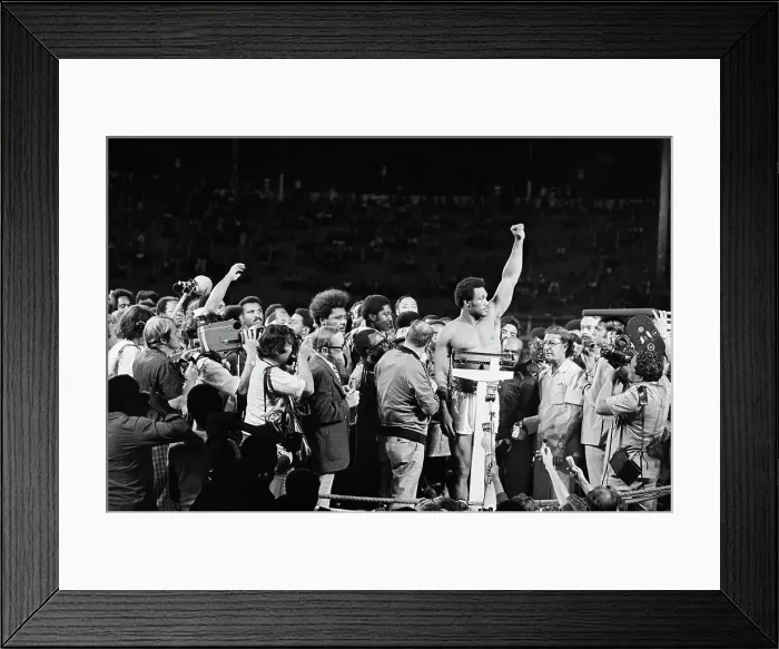 Framed Print : George Foreman Lifts Arm On Scale Framed Print : George Foreman Lifts Arm On Scale