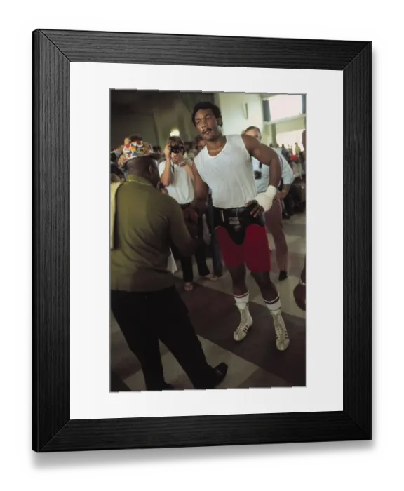 Framed Print : George Foreman Having Glove Removed by Trainer Framed Print : George Foreman Having Glove Removed by Trainer