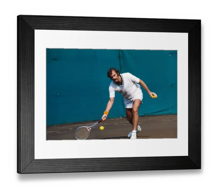 Framed Print : John Newcombe in Action on the Court Framed Print : John Newcombe in Action on the Court