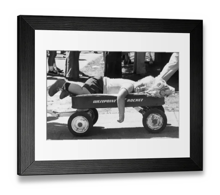 Framed Print : Child Sleeping In Wagon Framed Print : Child Sleeping In Wagon