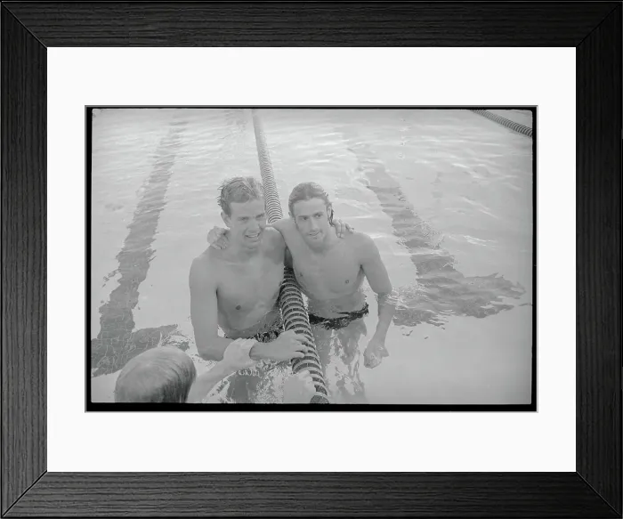 Framed Print : Swimming Opponents Embracing in Pool Framed Print : Swimming Opponents Embracing in Pool